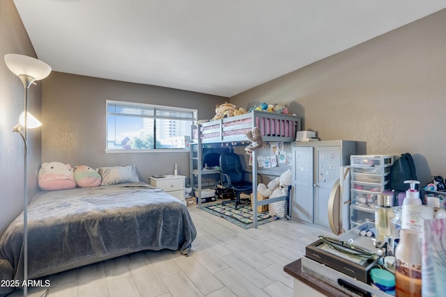 bedroom featuring light hardwood / wood-style floors