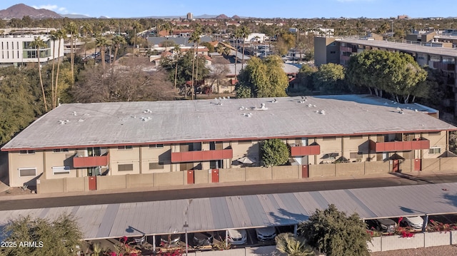 birds eye view of property featuring a mountain view