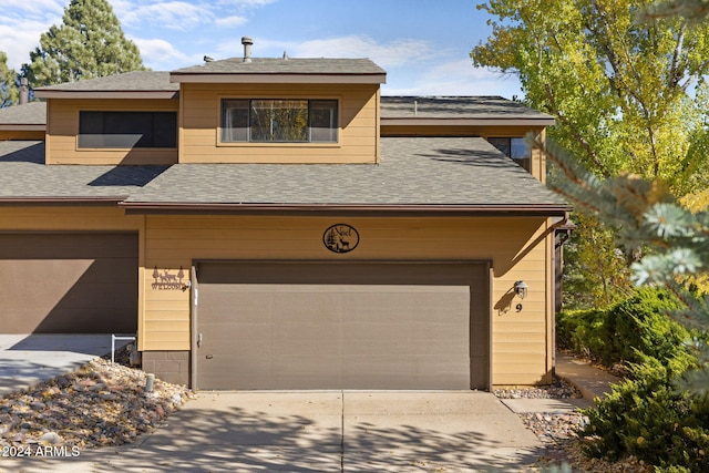 view of front of property with a garage