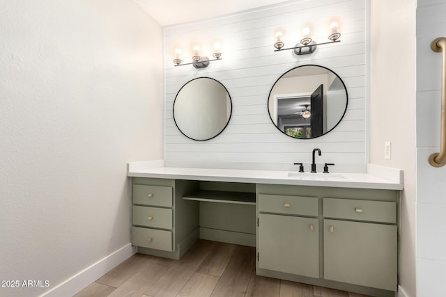 bathroom featuring vanity and hardwood / wood-style flooring