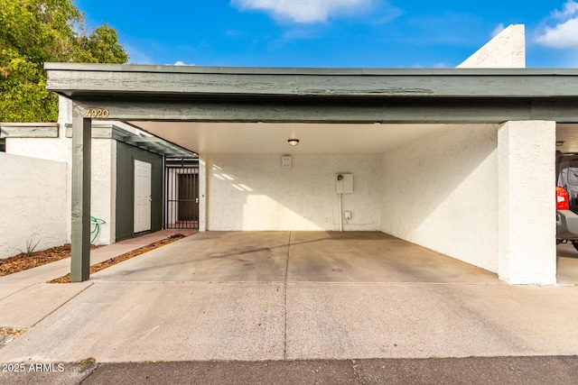 view of car parking featuring a carport