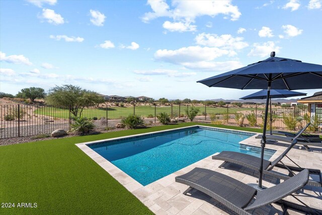28500 N Camel Rock Ct, Rio Verde, AZ 85263 - view of swimming pool featuring a lawn, a fenced in pool, a fenced backyard, and a patio area