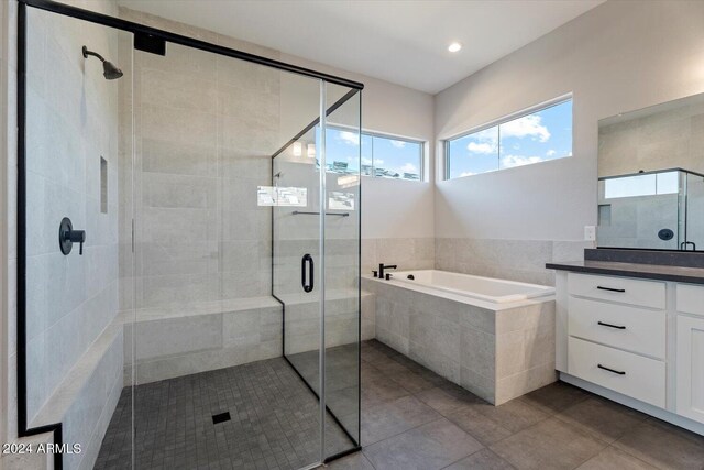 28500 N Camel Rock Ct, Rio Verde, AZ 85263 - bathroom with tile patterned flooring, vanity, a shower stall, and a bath