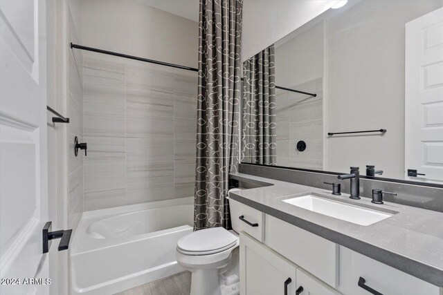 28500 N Camel Rock Ct, Rio Verde, AZ 85263 - bathroom with shower / bath combination with curtain, toilet, vanity, and wood finished floors