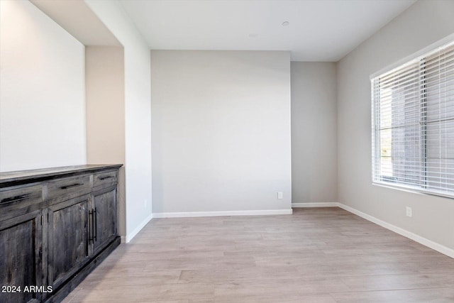 spare room featuring light hardwood / wood-style floors