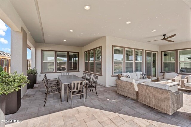 28500 N Camel Rock Ct, Rio Verde, AZ 85263 - view of patio / terrace featuring outdoor dining area, an outdoor living space with a fire pit, and a ceiling fan