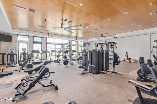 28500 N Camel Rock Ct, Rio Verde, AZ 85263 - gym with a ceiling fan, visible vents, wood ceiling, and a raised ceiling