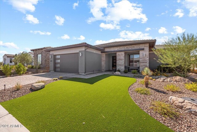 28500 N Camel Rock Ct, Rio Verde, AZ 85263 - prairie-style house with stone siding, a tiled roof, a garage, stucco siding, and driveway
