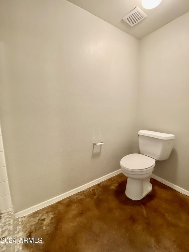 bathroom featuring toilet