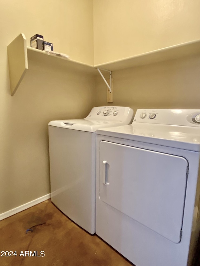 laundry room with washer and dryer