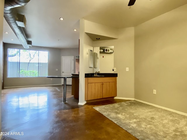 kitchen featuring ceiling fan