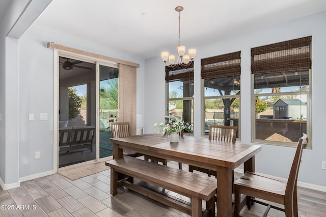 dining room featuring a chandelier