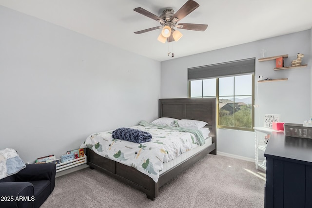 bedroom with ceiling fan and carpet floors