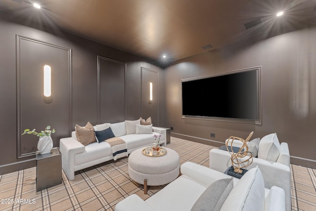 living room featuring visible vents, recessed lighting, and baseboards