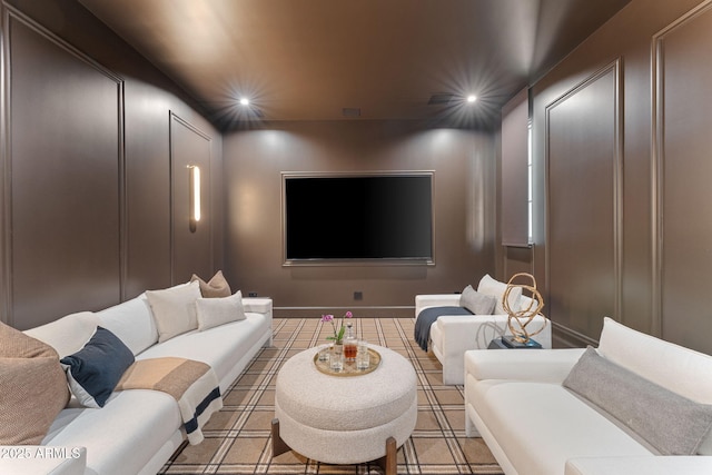 cinema room with recessed lighting