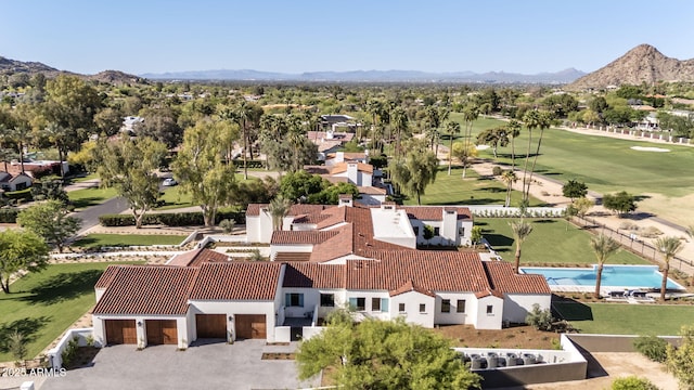 birds eye view of property featuring a residential view, a mountain view, and golf course view