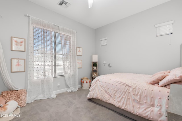 bedroom featuring baseboards, visible vents, ceiling fan, and carpet flooring