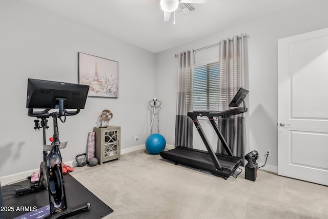 workout room featuring a ceiling fan, carpet, visible vents, and baseboards