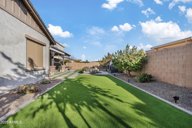 view of yard featuring a fenced backyard and a patio