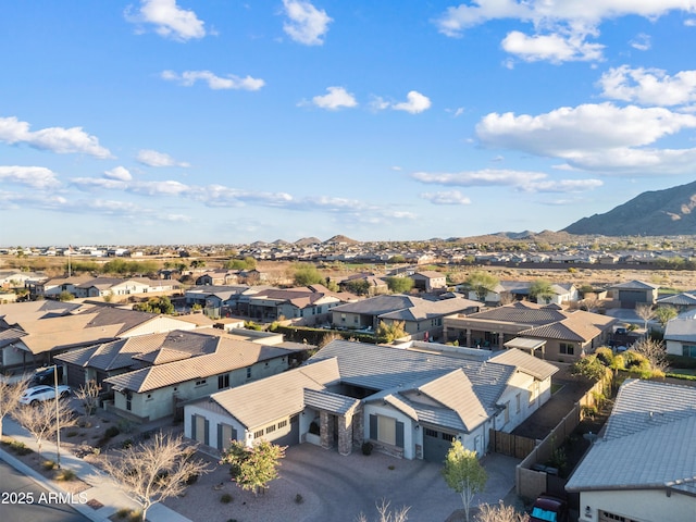 aerial view featuring a residential view and a mountain view