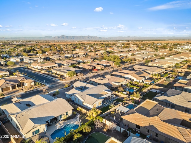 birds eye view of property with a residential view and a mountain view