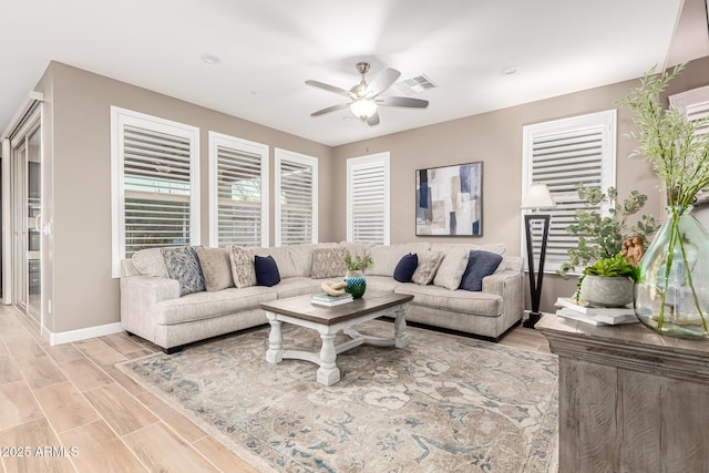 living room with ceiling fan