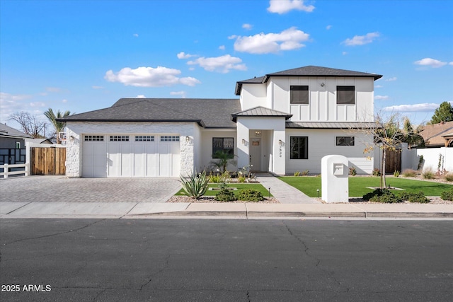 modern farmhouse style home with a garage