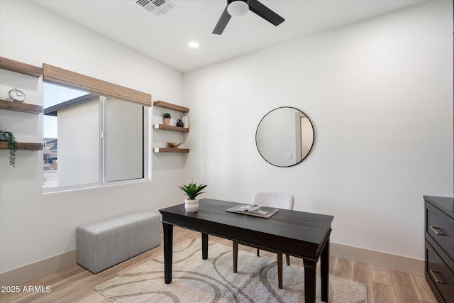 office area with ceiling fan and light wood-type flooring