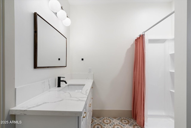 bathroom featuring vanity and walk in shower