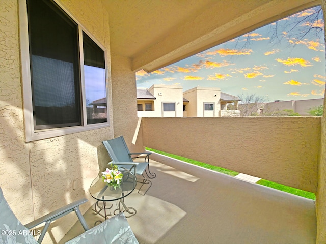 view of patio with a balcony