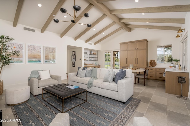 living room featuring a wealth of natural light, visible vents, high vaulted ceiling, and beamed ceiling