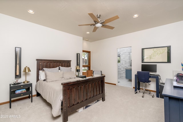 bedroom with recessed lighting, light colored carpet, ensuite bathroom, and baseboards