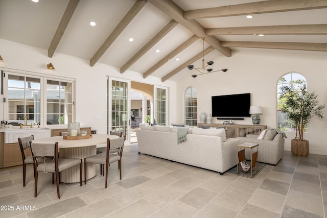 living area featuring recessed lighting, beamed ceiling, and high vaulted ceiling