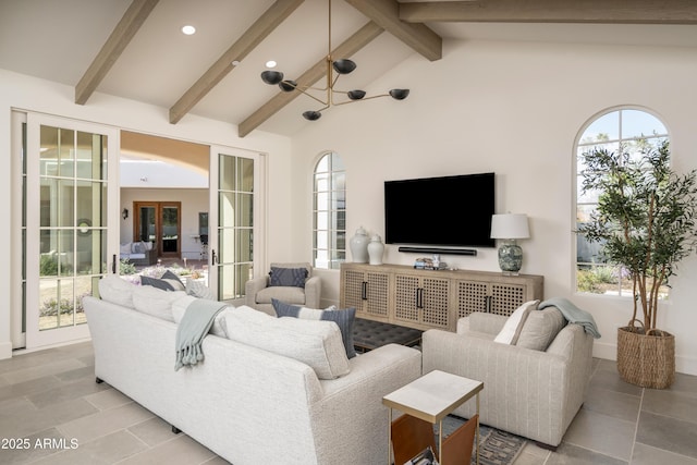 living room featuring plenty of natural light, recessed lighting, vaulted ceiling with beams, and french doors