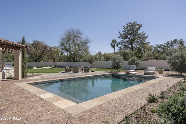 view of pool featuring a fenced in pool, an outdoor hangout area, a fenced backyard, a patio, and a diving board