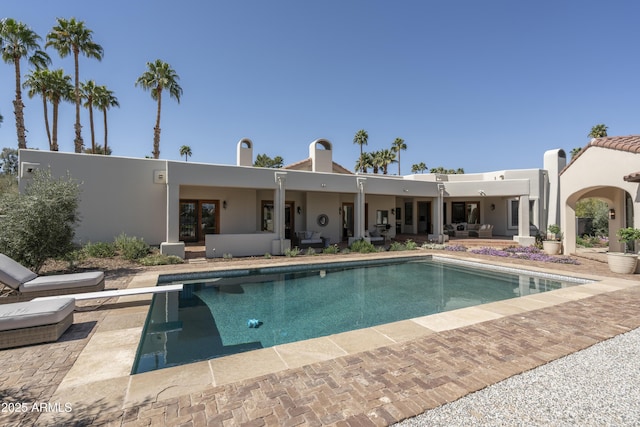 pool featuring a patio area