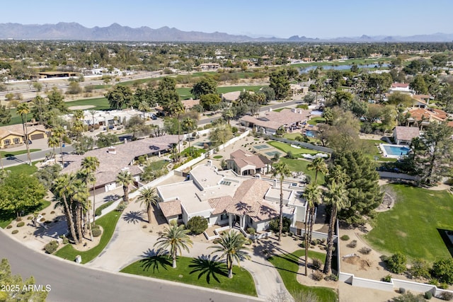 drone / aerial view with a residential view and a mountain view