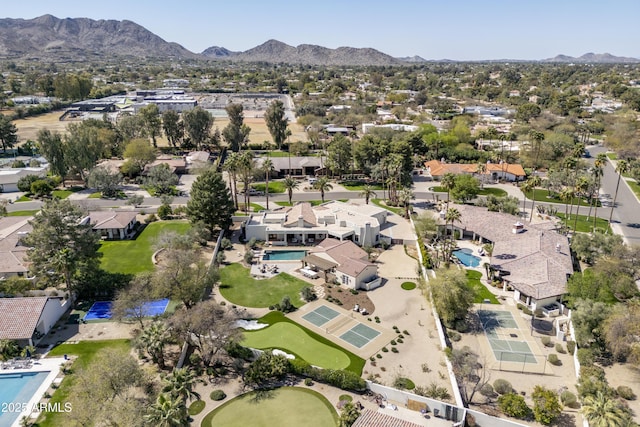 birds eye view of property with a mountain view and a residential view