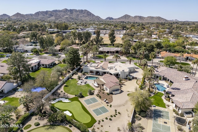 birds eye view of property with a residential view and a mountain view