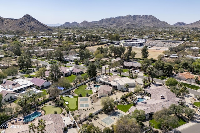 drone / aerial view featuring a mountain view and a residential view