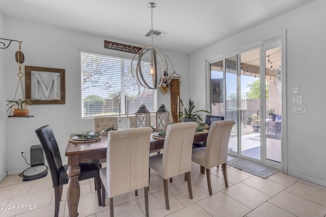 dining area with light tile flooring