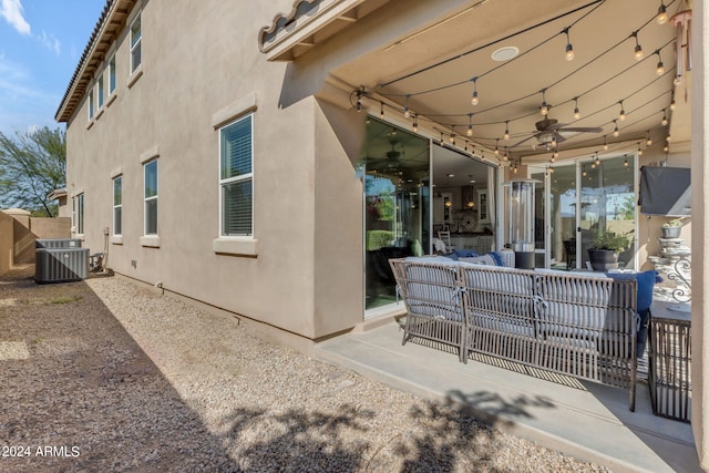 view of patio / terrace with central AC, outdoor lounge area, and ceiling fan