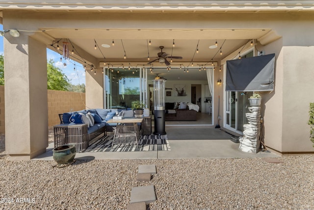 view of terrace with ceiling fan and an outdoor hangout area