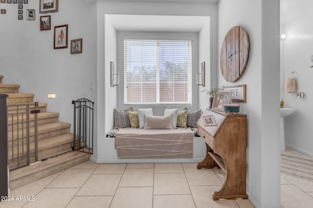 interior space featuring light tile floors