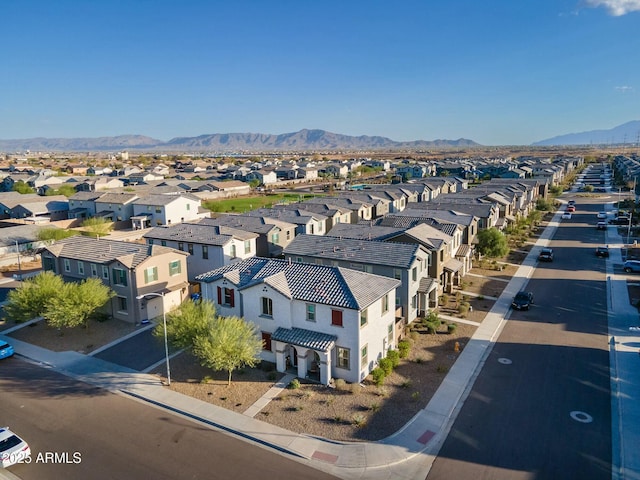 drone / aerial view with a residential view and a mountain view