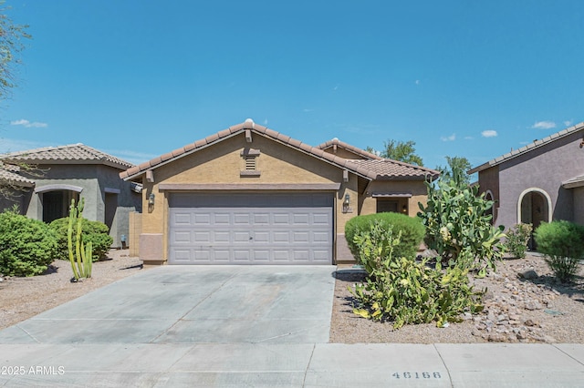 view of front of property with a garage