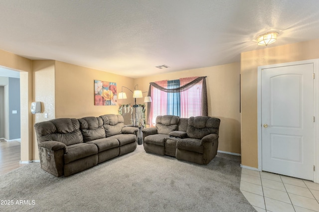 living room with light tile patterned floors