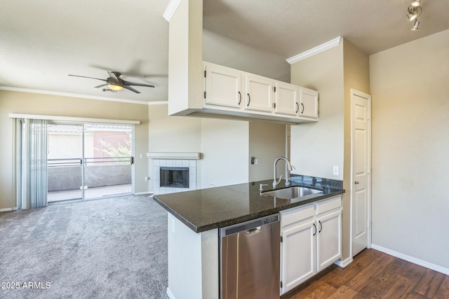 5401 E Van Buren St Unit 3048, Phoenix, AZ 85008 - kitchen with stainless steel dishwasher, a sink, crown molding, ceiling fan, and white cabinetry