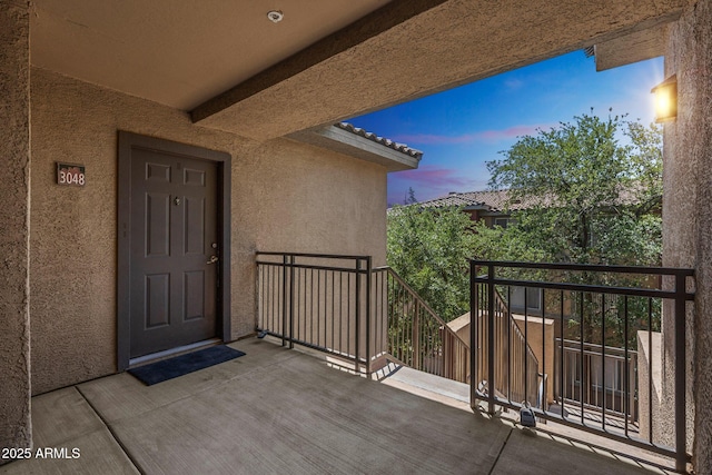 5401 E Van Buren St Unit 3048, Phoenix, AZ 85008 - entrance to property with a balcony and stucco siding