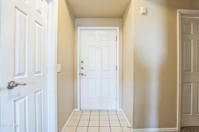 5401 E Van Buren St Unit 3048, Phoenix, AZ 85008 - entryway featuring baseboards and light tile patterned floors